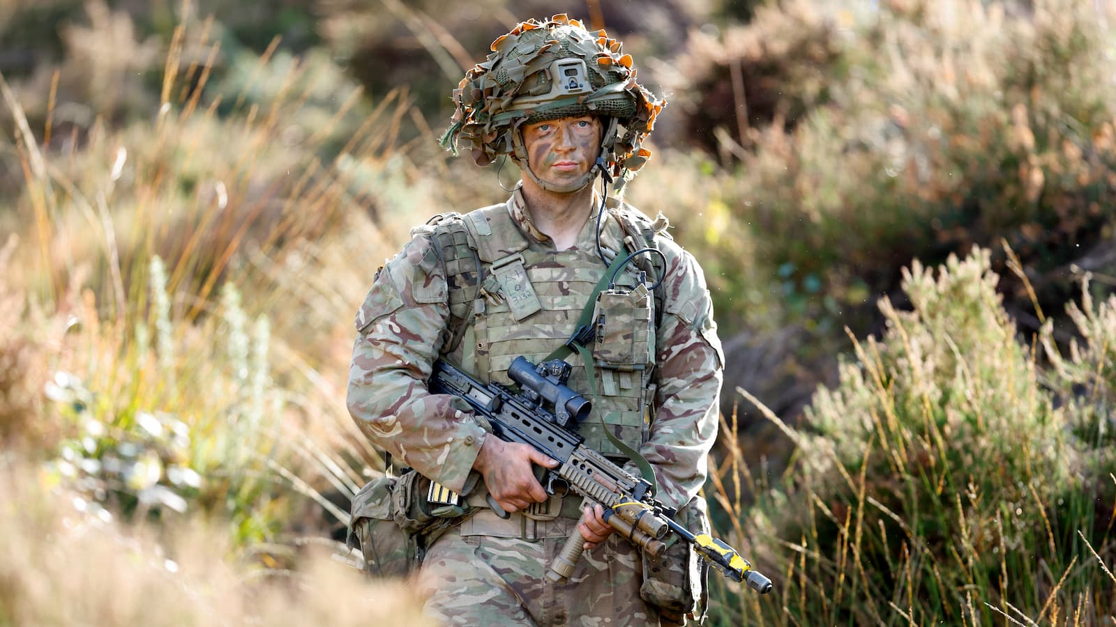 A soldier of 1st Battalion London Guards takes part in a training exercise on Hankley Common on October 16, 2024 in Farnham, England