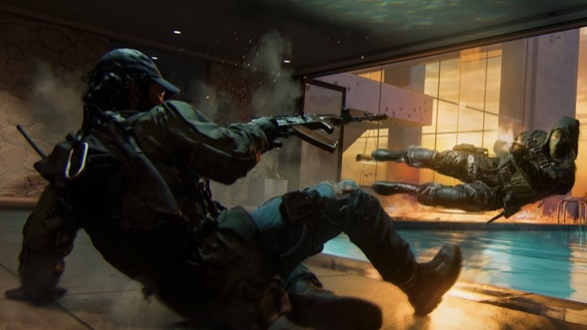 Two operators dive around each other while firing their weapons