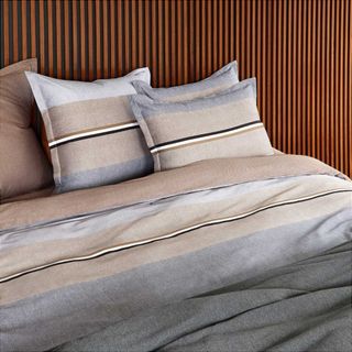 Iconic Stripe Bed Linen on a bed.