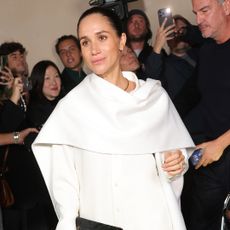 PARIS, FRANCE - OCTOBER 04: Meghan Markle, Duchess of Sussex attends the Balenciaga Womenswear Spring/Summer 2026 show as part of Paris Fashion Week on October 04, 2025 in Paris, France. (Photo by Arnold Jerocki/Getty Images for Balenciaga)