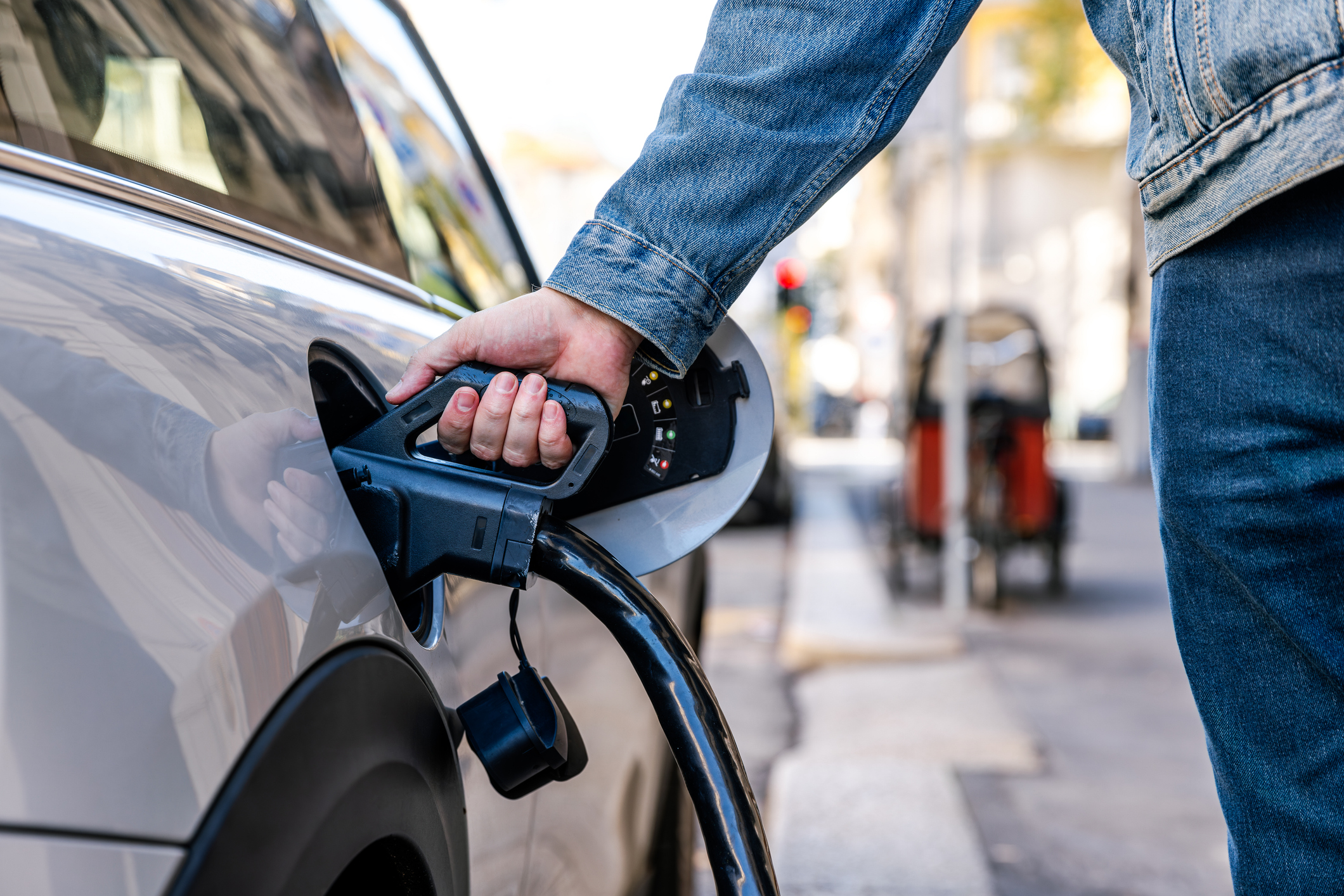 Electric vehicle being charged