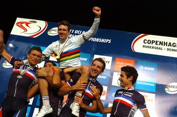 U23 men's world champion Arnaude Demare (France) is hoisted aloft by his teammates.