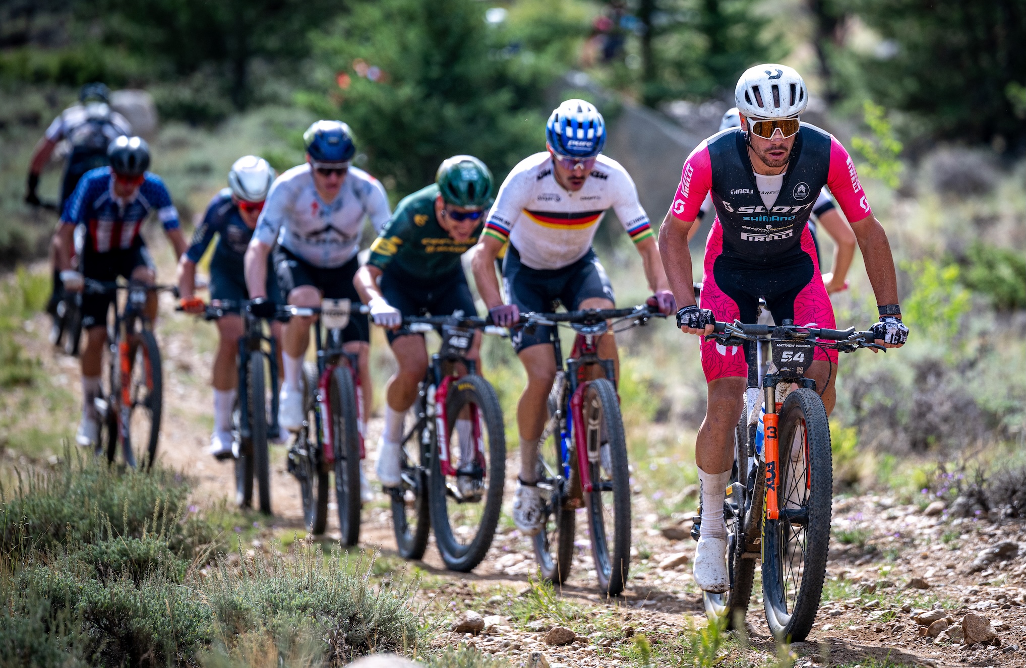 Matt Wilson leads front group of men in chase of lone leader Swenson