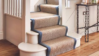 brown stair runner on wooden staircase