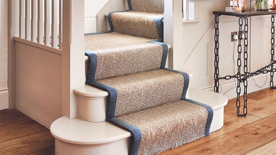 brown stair runner on wooden staircase