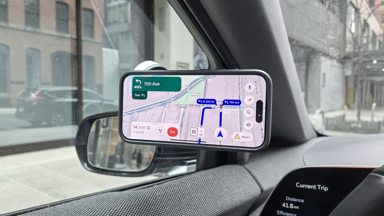 Portable Vacuum Magnetic Phone Holder Stand against windshield.