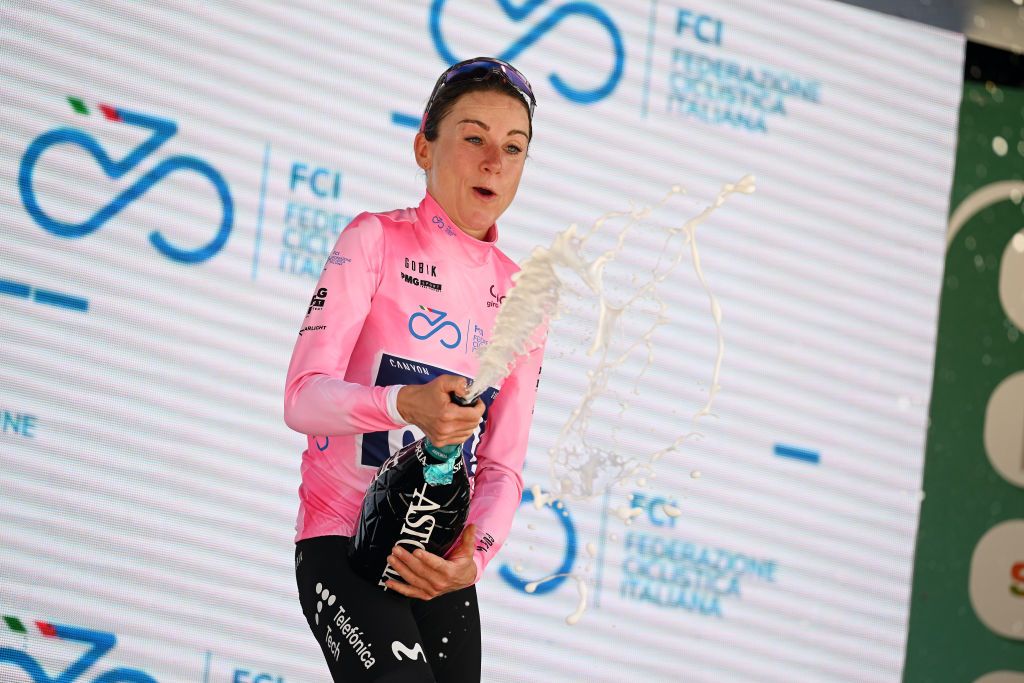 MODENA ITALY JULY 02 Annemiek Van Vleuten of The Netherlands and Movistar Team Pink Leader Jersey celebrates at podium during the 34th Giro dItalia Donne 2023 Stage 3 a 1182km stage from Formigine to Modena UCIWWT on July 02 2023 in Modena Italy Photo by Dario BelingheriGetty Images