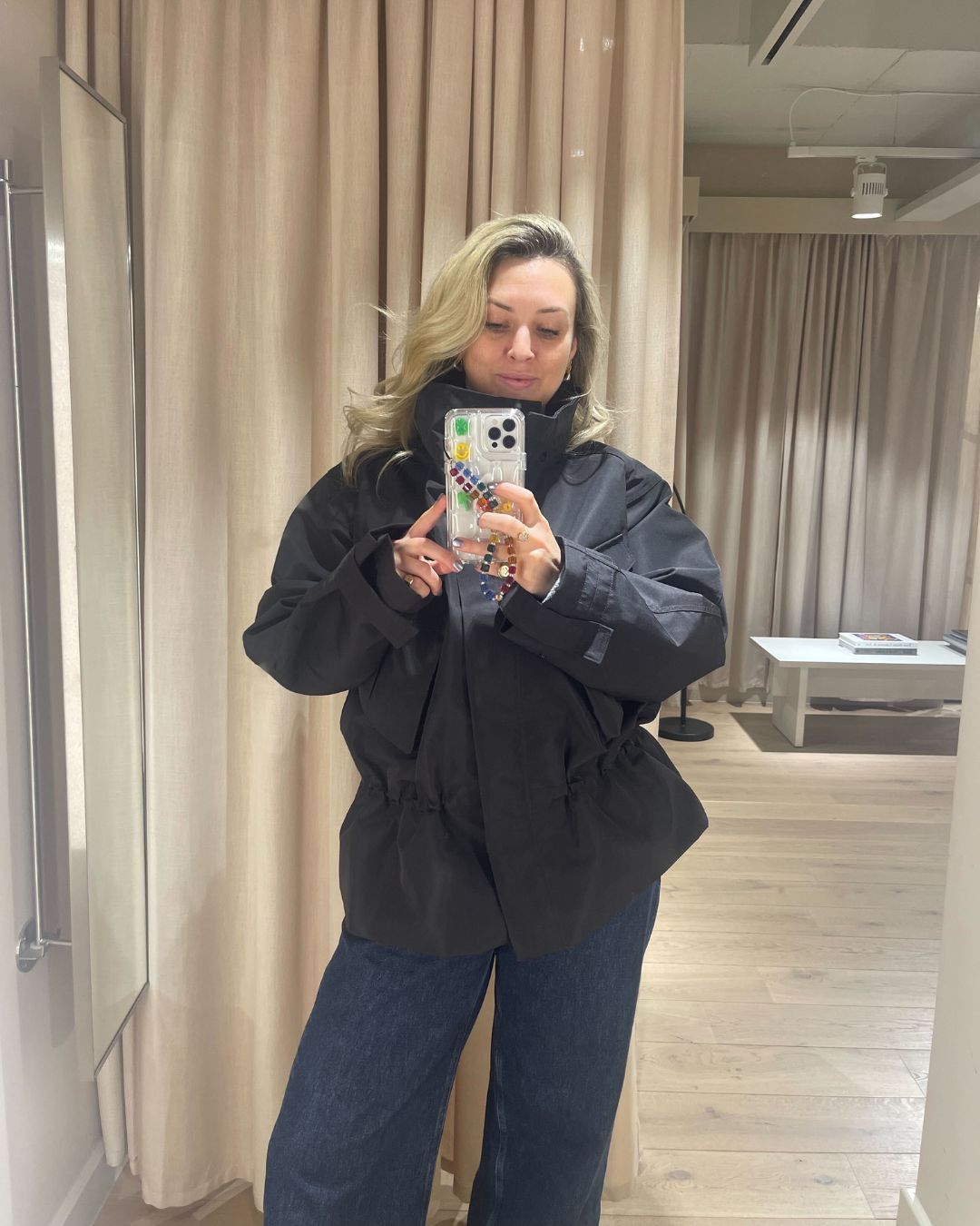 clementina jackson tries on a spring jacket from the new H&amp;amp;M studio collection