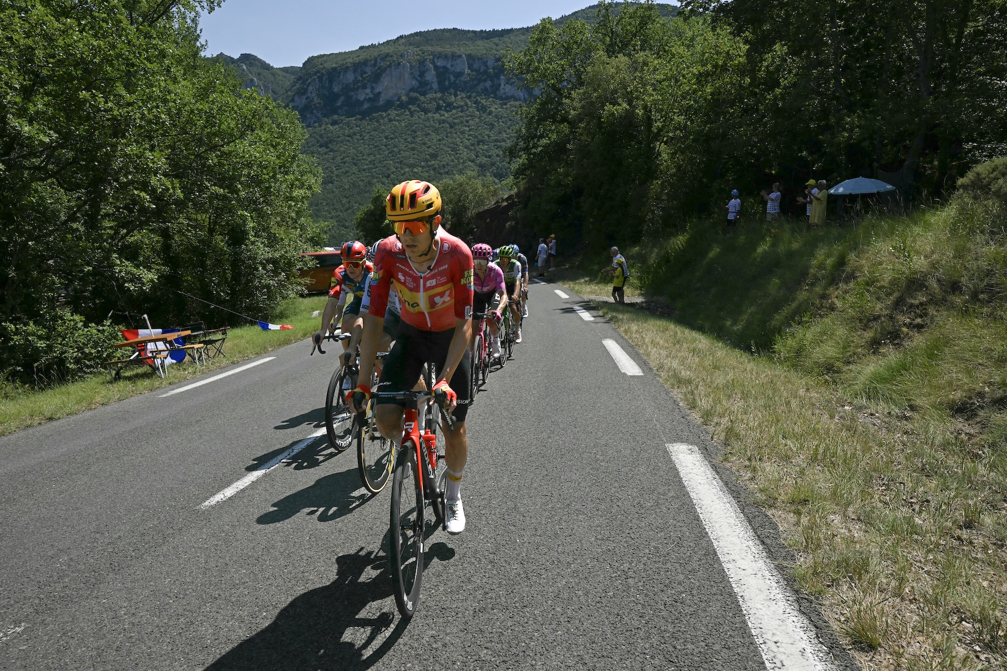Uno-X Mobility team's Norwegian rider Torstein Tr&amp;aelig;en leads the chasing group during the 4th stage of the 113th edition of the Tour de France cycling race, 181,9 km between Carcassonne and Foix in southwestern France, on July 7, 2026. (Photo by Loic VENANCE / AFP)
