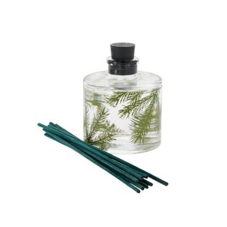 Thymes Frasier Fir Petite Reed Diffuser in a pine-covered bottle