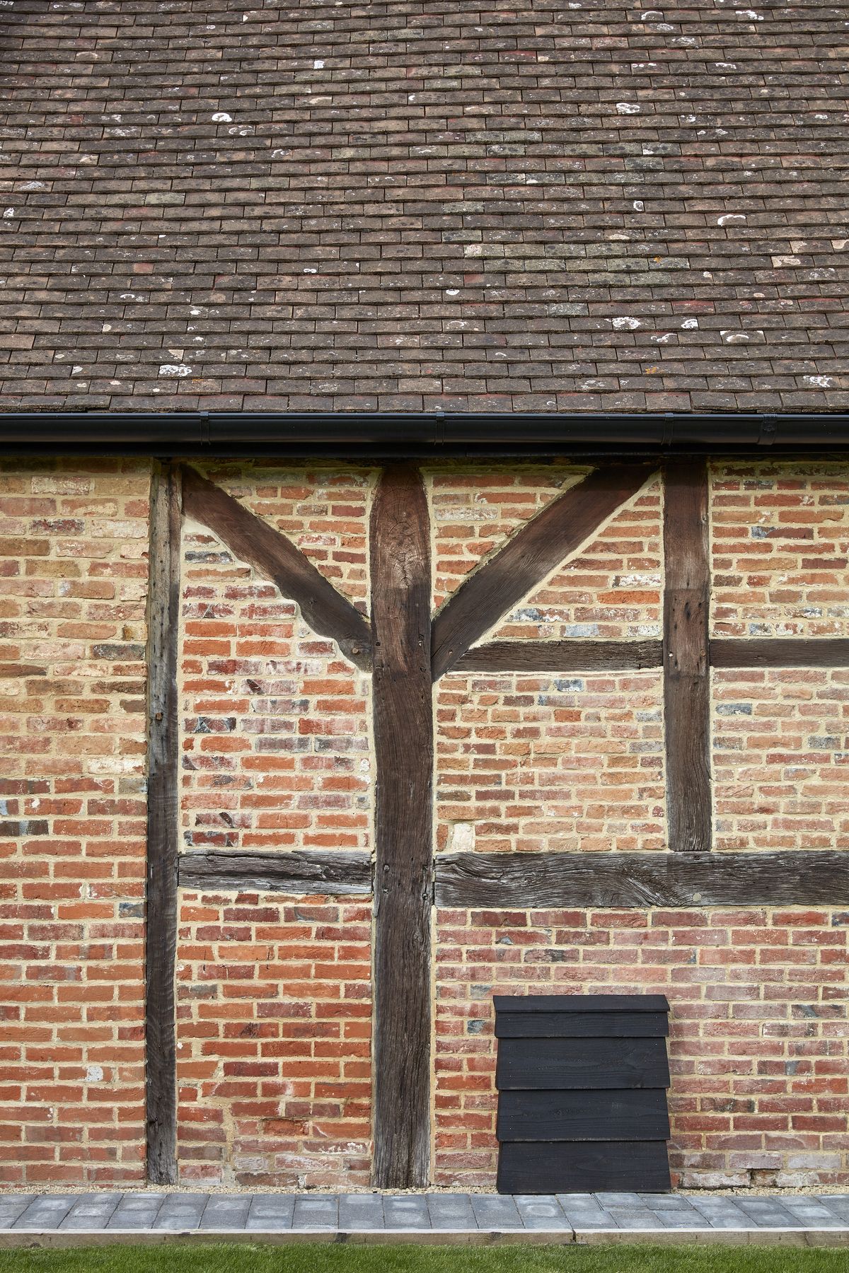 side of brick and timber barn conversion