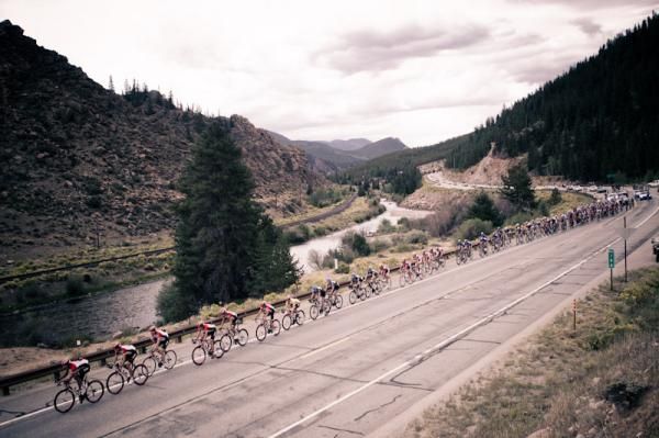 The peloton passes along the banks of the Arkansas River.