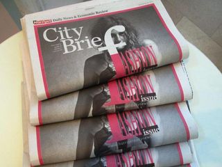 Freshly pressed Istanbul fashion week newspapers, which were given out during the week