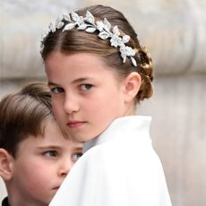 Princess Charlotte in a headpiece at King Charles' Coronation