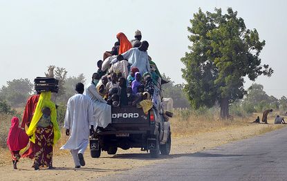 Nigerians flee from Boko Haram extremists.