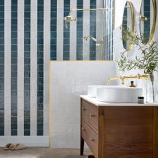 Blue and white stripe tiles in a bathroom