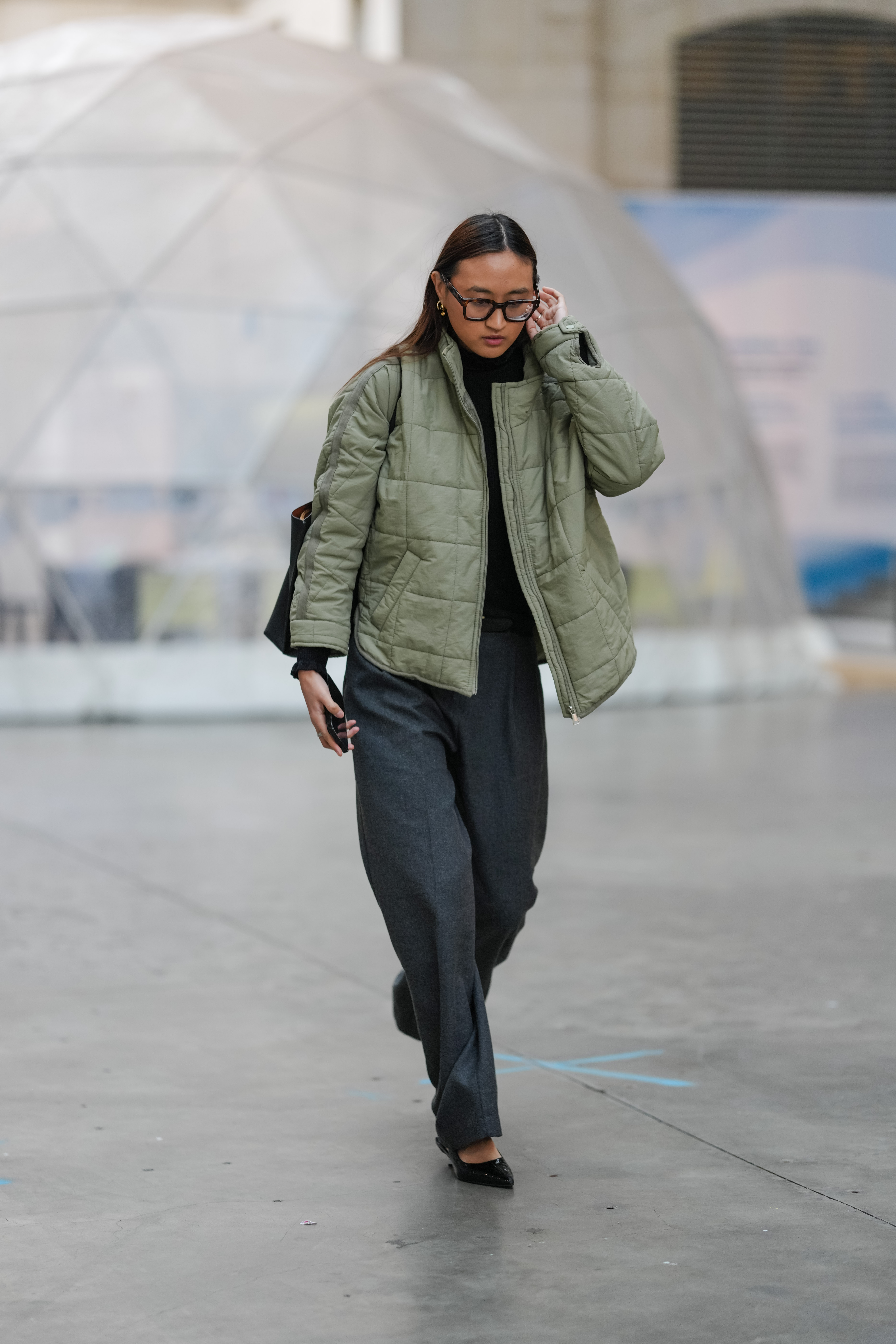 woman wearing quilted jacket