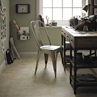 porcelain tiles with rugged look and wooden table with chair