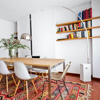 dining table with Arco Lamp over