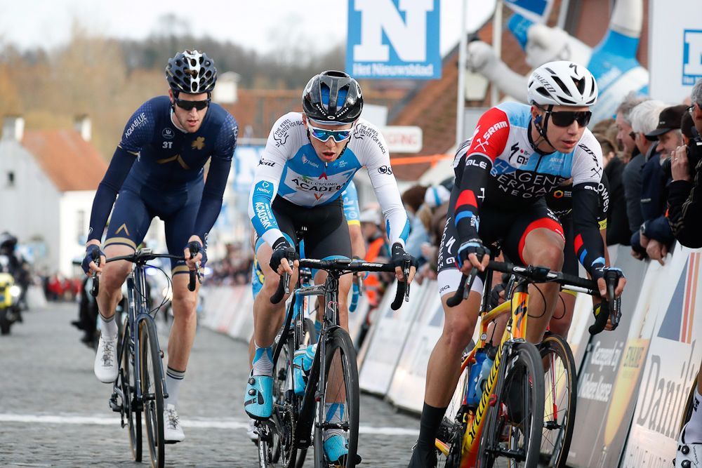 Conor Dunne, Daniel Turek and Ivo Oliveira in the breakaway at Nokere Koerse