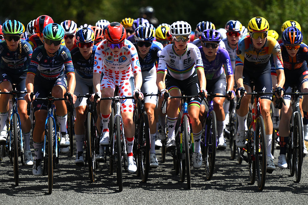 BELLEVILLE-EN-BEAUJOLAIS, FRANCE - AUGUST 05: (L-R) Justine Ghekiere of Belgium and Team AG Insurance - Soudal, Puck Pieterse of Netherlands and Team Fenix - Premier Tech - Polka dot Mountain Jersey, Magdeleine Vallieres Mill of Canada and Team EF Education - Oatly and a general view of the peloton competing during the 5th Tour de France Femmes 2026, Stage 5 a 140km stage from Macon to Belleville-en-Beaujolais / #UCIWWT / on August 05, 2026 in Belleville-en-Beaujolais, France. (Photo by Alex Broadway/Getty Images)