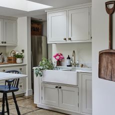shaker style county kitchen with neutral units, belfast sink and vintage accessories