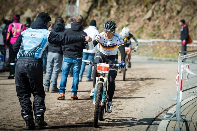 Sabine Spitz races through the feed zone