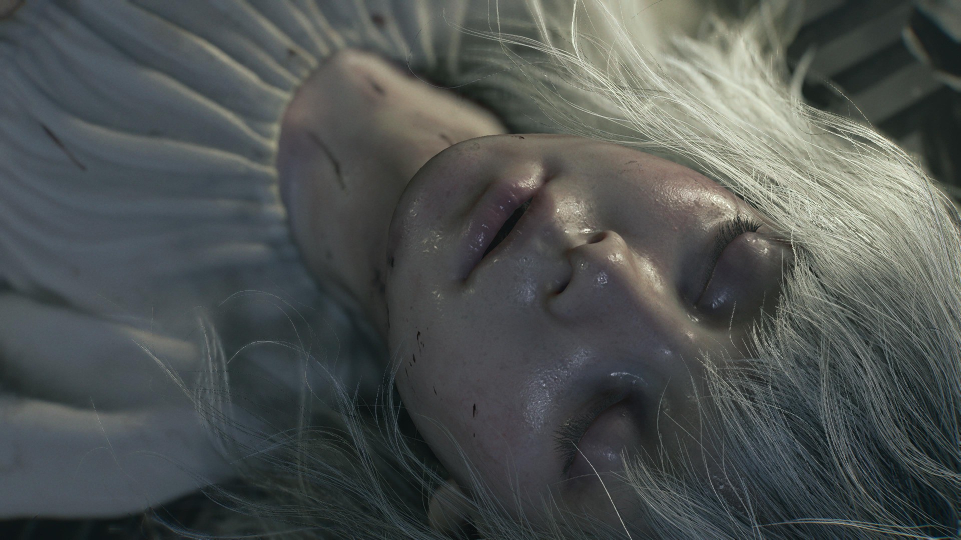 Emily lies on the ground, sweating