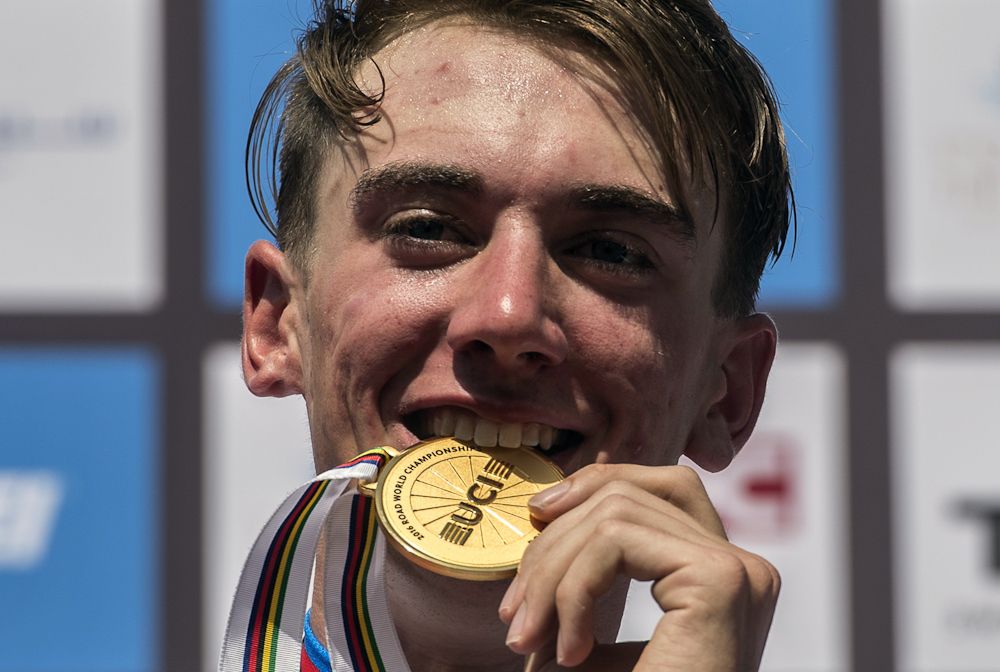US gold medallist Brandon McNulty celebrates on the podium at the end of the men's junior individual time trial event as part of the 2016 UCI Road World Championships
