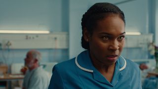 Sabrina (Nadine Mills) in a nurse uniform in the hospital in Netflix's "Supacell"