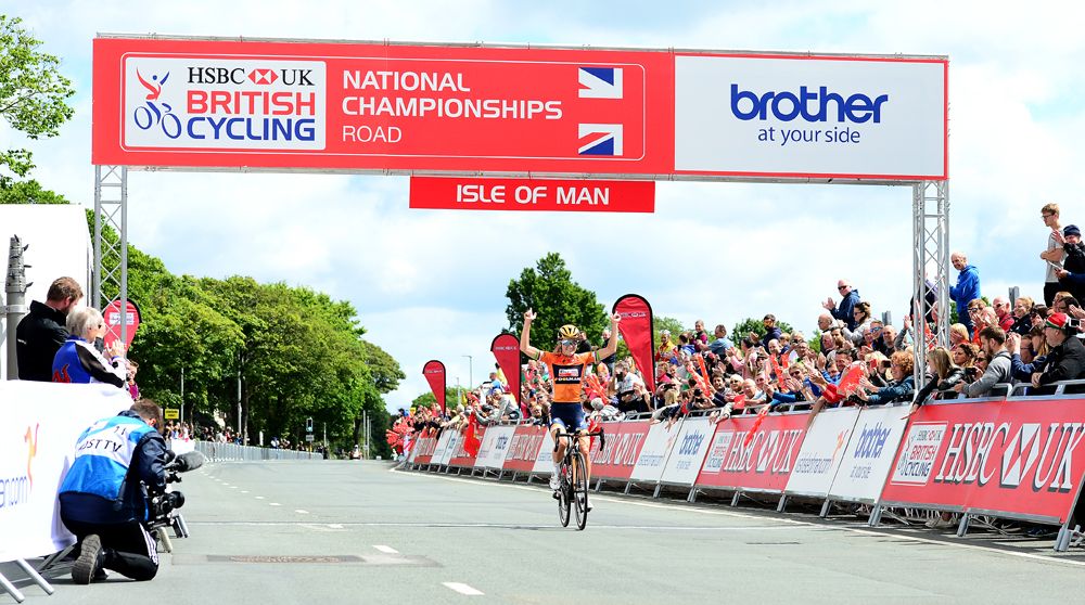 Lizzie Deignan crosses the line