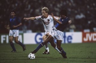 Soviet Union midfielder Oleksiy Mykhaylychenko competes for the ball with Italy's Fernando De Napoli at Euro 88.