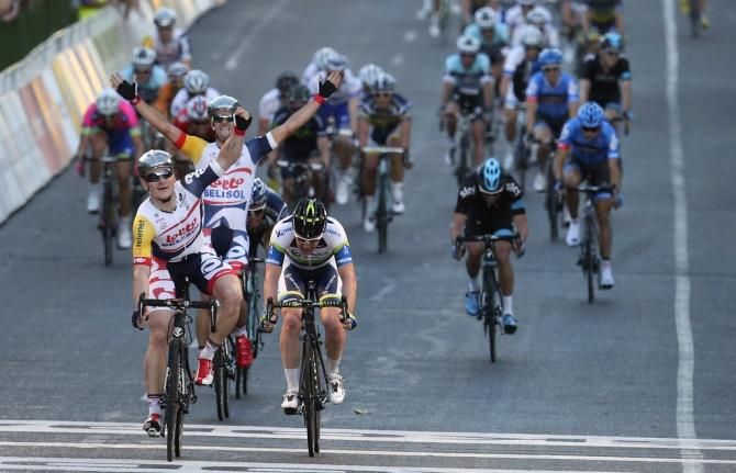 Andr&eacute; Greipel and lead up man Greg Henderson celebrate the win in 2013