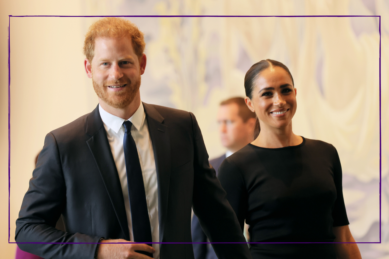 Prince Harry and Meghan Markle smiling