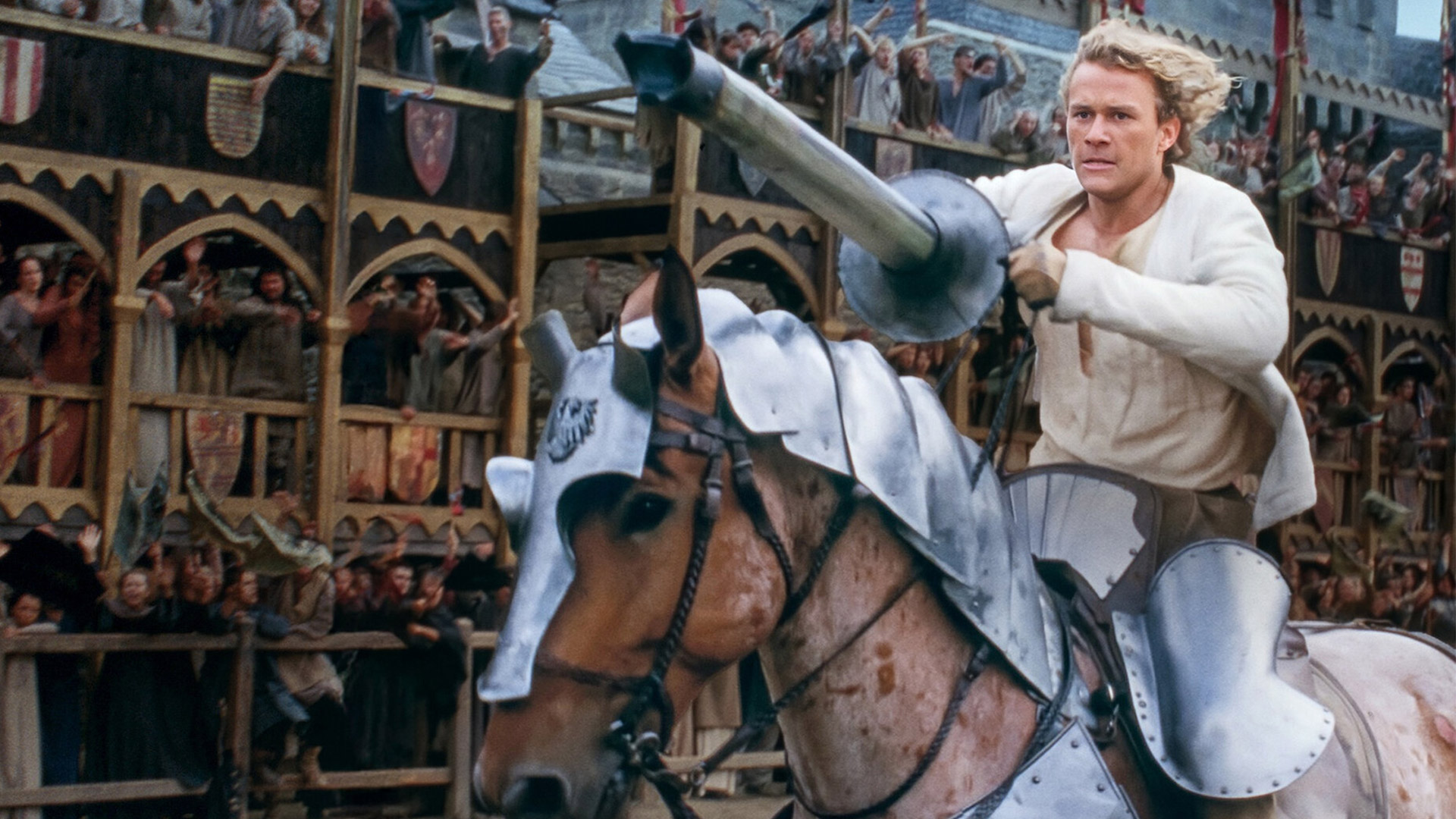 Heath Ledger rides a horse while jousting in A Knight&#039;s Tale