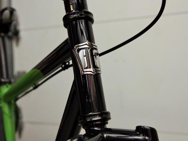 True Fabrication's head tube badges are cut with a water jet and then bent as needed.