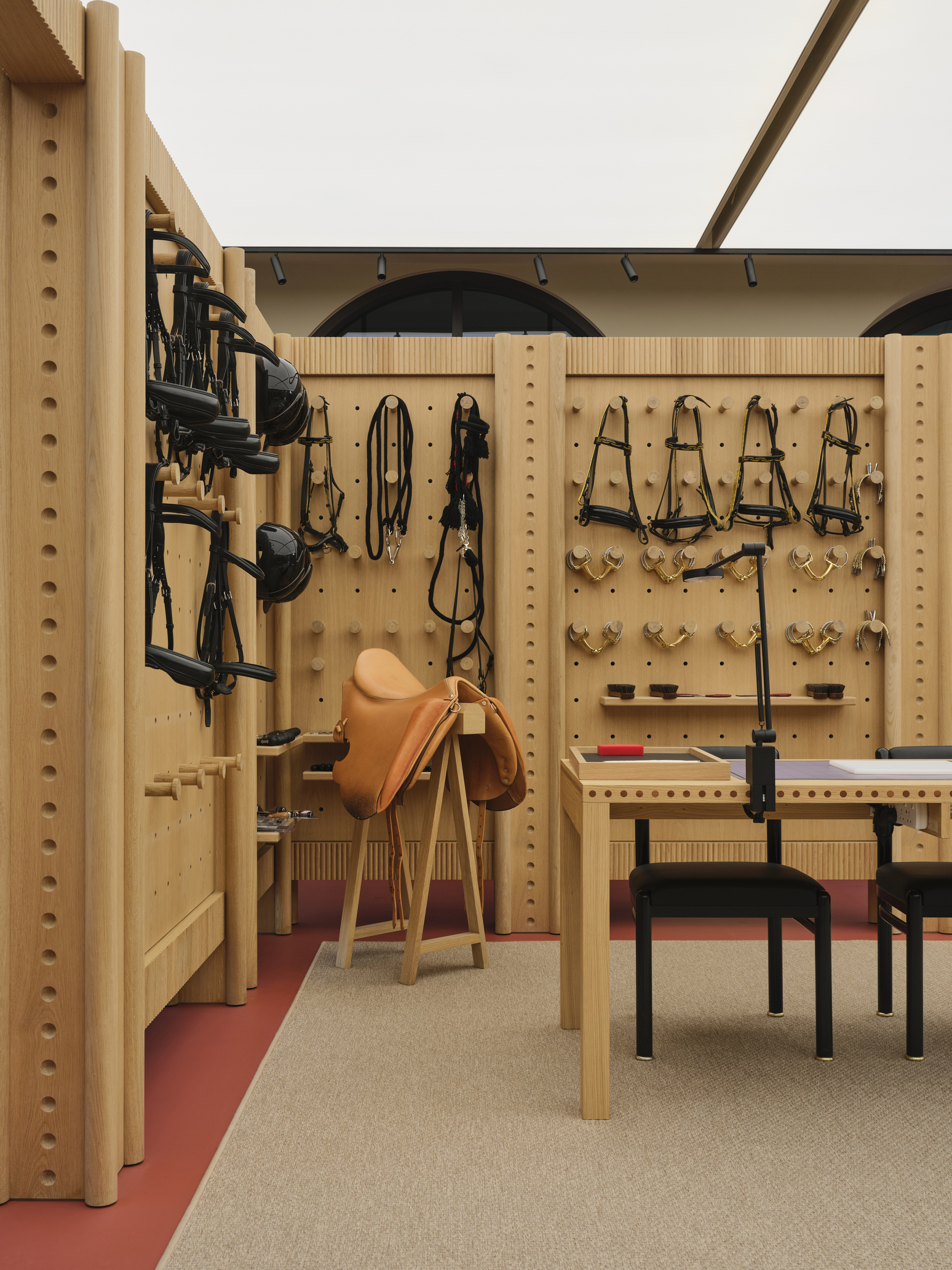 timber-clad equestrian workshop