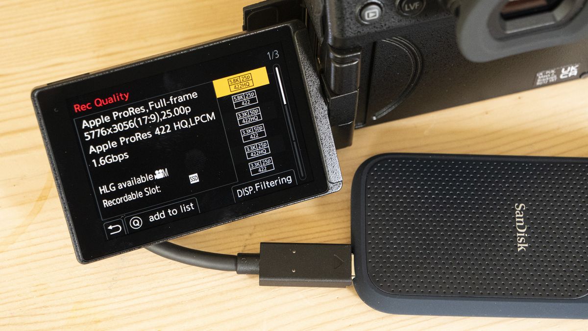 Panasonic Lumix S5 IIX camera on a table with ProRes raw recording option on touchscreen