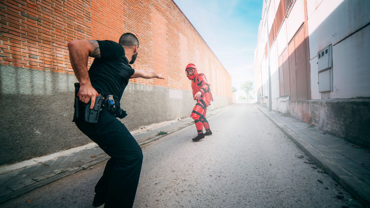 Tactical police training. Man with anti-shock clothing. 