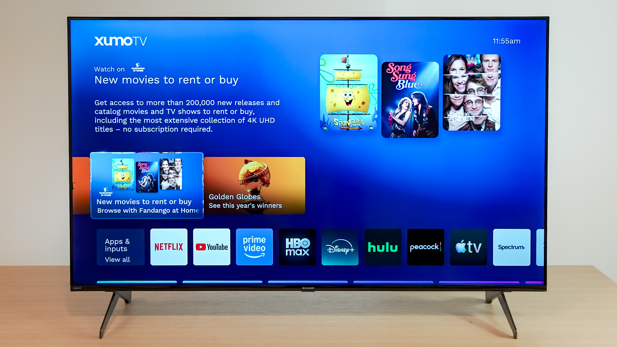 A Sharp Aquos QLED TV on a table