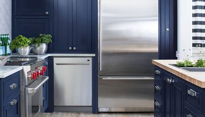 a small blue kitchen