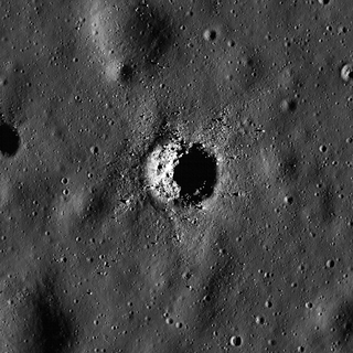 This image shows a bench crater in the lunar mare. Bench craters are so called because they have a small bench lining the interior of the crater wall. This image was released June 5, 2013.