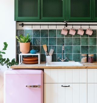retro pink and green kitchen