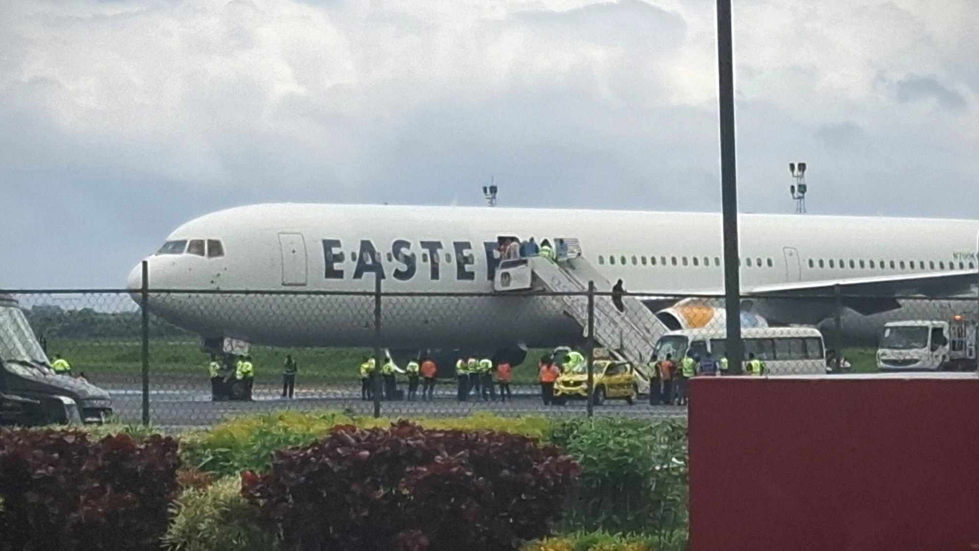 A plane carrying the deportees from the United States arrives at the Roberts International Airport outside of Monrovia, Liberia.