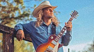 Frank Hannon of Tesla poses with a Gibson Les Paul