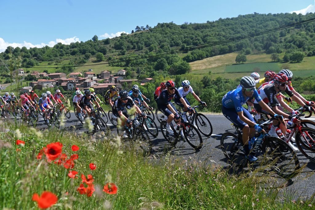 The Criterium du Dauphine peloton enjoys the sun and rolling roads