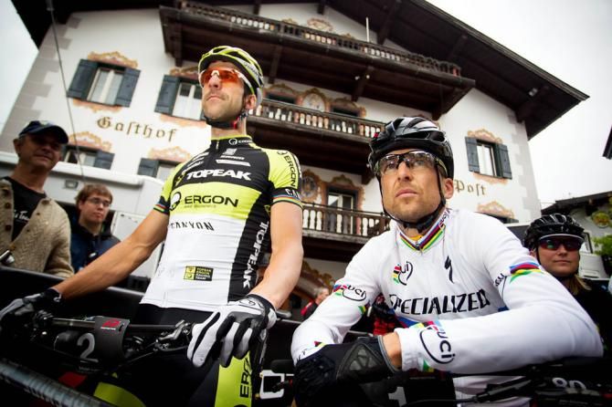 Race leader Christoph Sauser on the start line