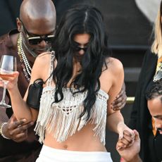 Kylie Jenner carried two rare The Row bags, the mesh Barn Tote and the 90s Bag, in Venice