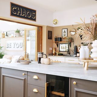 neutral kitchen with island and bar area