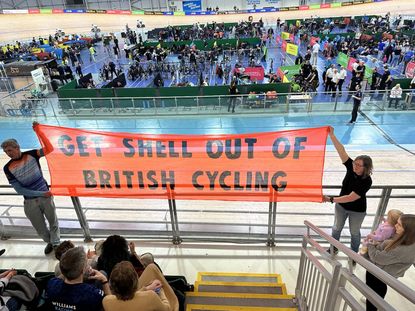 Extinction Rebellion hold 'Get shell out of british cycling' banner